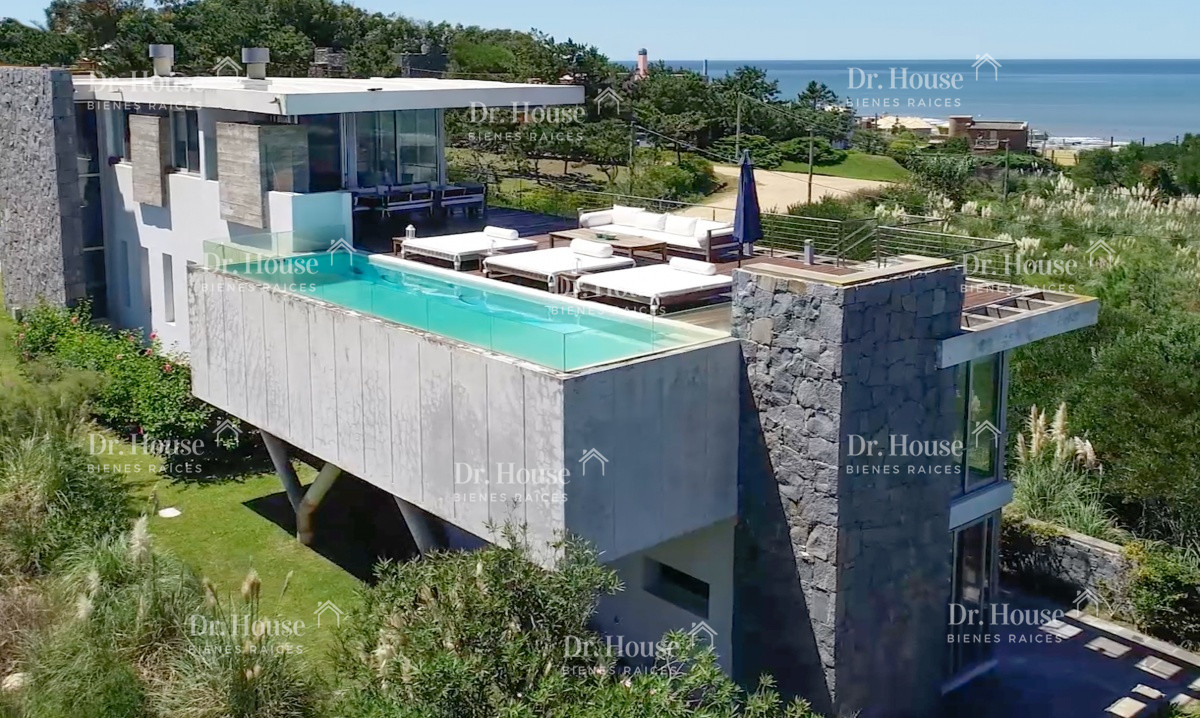moderna casa de lujo amoblada con piscina climatizada y la mejor vista al mar en punta piedras - drh434c