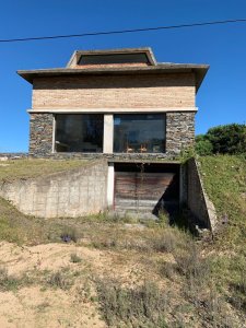 Casa en Manantiales Venta y Alquiler