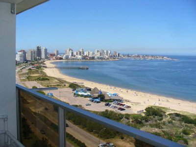 Piso alto, terraza, frente al mar