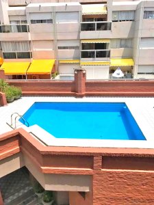 Península, 2 dorm, con piscina y garaje.