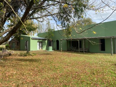 Chacra en venta con casa de dos dormitorios en Pueblo Eden