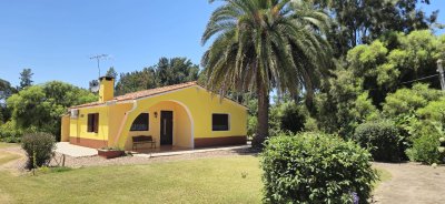 Casa con gran terreno de 9026 m2 sobre Ruta 11 
