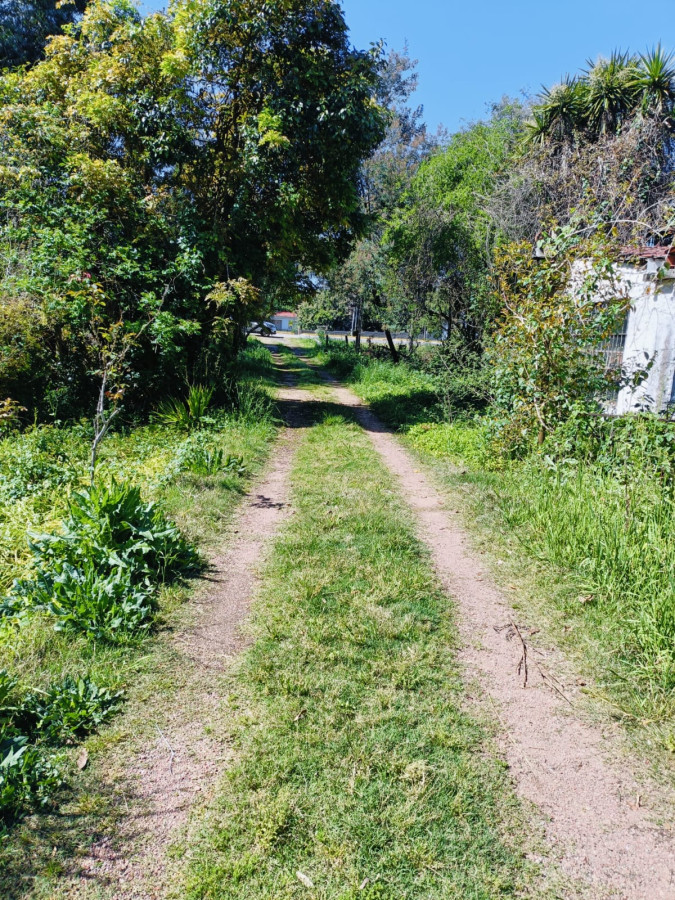 Terreno y casa en venta por ruta 8