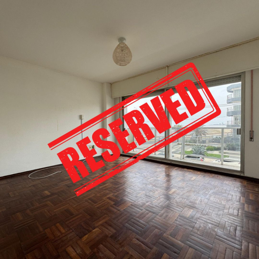 Venta apartamento 2 dormitorios con vista a la rambla y garage en Malvin 