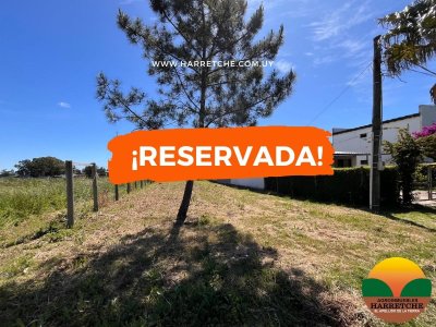 Terreno en Las Piedras, 380 m2, nivelado, cercado, a 2 cuadras de ruta 48. 