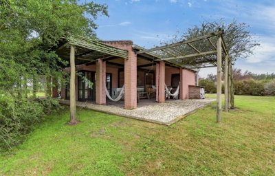 Chacra + café funcionando + cabañas próximo a San Carlos