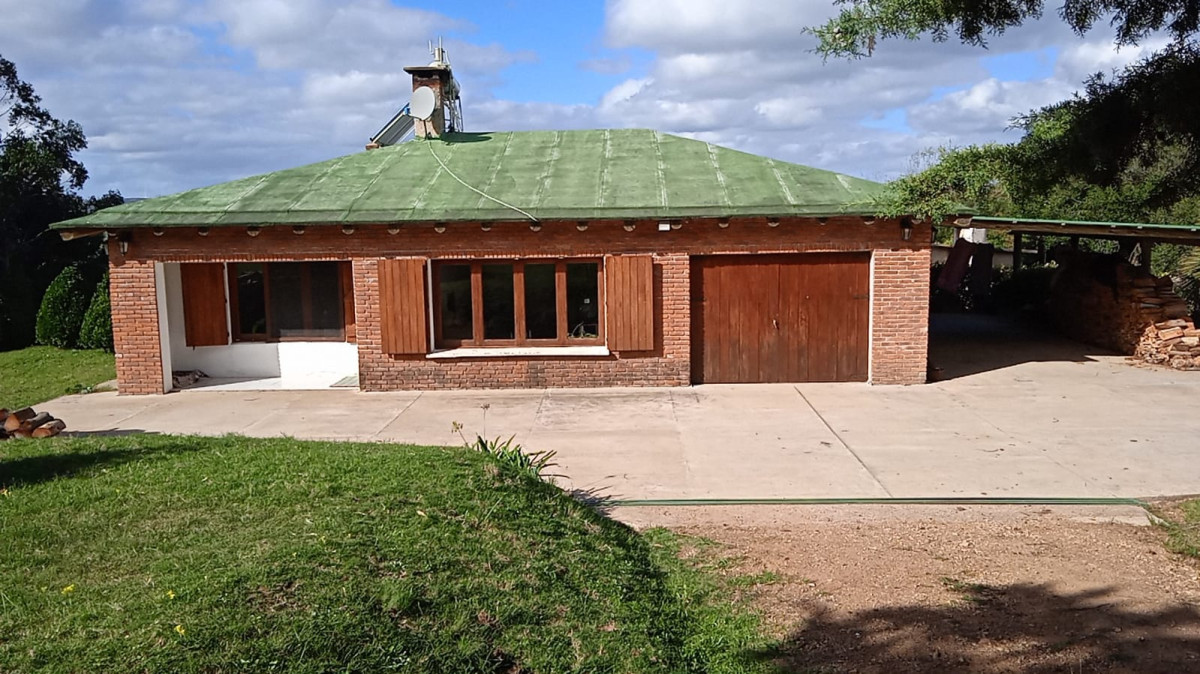 Venta de Chacra con casa en Eden  Ruta 12 . 