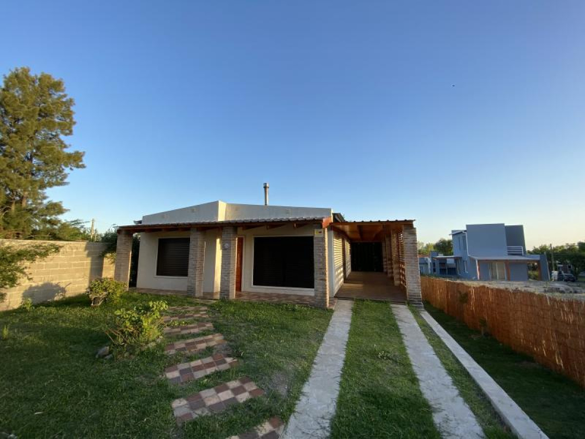 Excelente casa a estrenar en venta en Colonia Del Sacramento.
