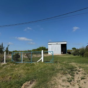 Terreno con galpón en Ecilda Paullier - Cerrado y cercado - Ideal inversion o vivienda
