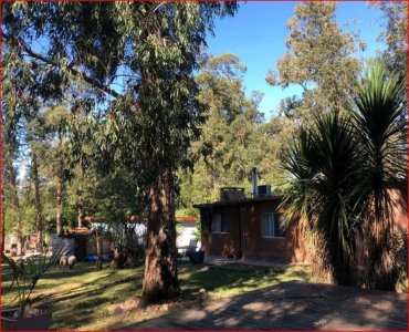 Venta de casas en las Grutas, 5000m2 de tierra,  3 casas, 6 dormitorios.